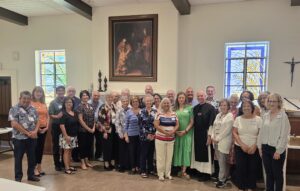 Knights and Dames of the Phoenix and Tucson areas with Fr. Tom Enniking at the Exaltation of the Holy Cross day retreat at Crozier Village, South Phoenix